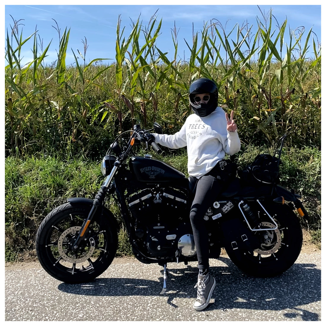 Femme Rider Alex feels Badass on her Harley